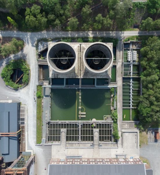 Home Aerial view of industrial water treatment facility surrounded by greenery in Bochum, Germany.