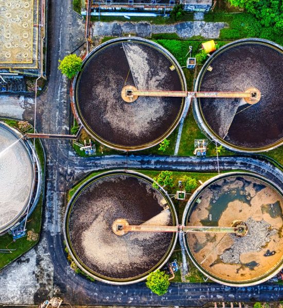 Home Aerial shot of a water treatment plant in Serang, Indonesia with circular tanks.